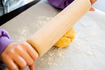 Kid's Hands Rolling Shortcrust Dough Up Close