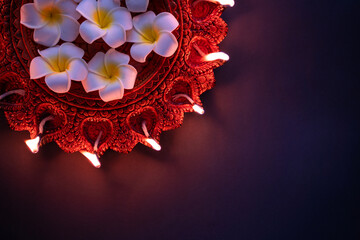 Closeup image of traditional Diya lamp, Happy Diwali background