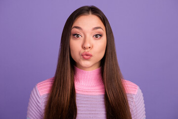 Kiss. Portrait of cute lovely girl sending blowing kiss with pout lips at isolated on gray background. Affection feelings concept. Portrait pretty woman sends air kiss - obrazy, fototapety, plakaty