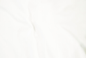Obraz premium abstract white fabric background. soft and smooth creased silk cloth as wave for graphic design element
