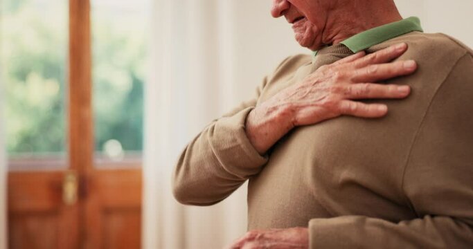 Hands, senior man and heart attack with pain, cardiovascular healthcare and risk of hypertension at home. Closeup, elderly and massage chest for heartburn, indigestion and medical emergency of stroke