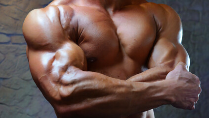 Close-up shot of muscular male body and Bodybuilding athlete