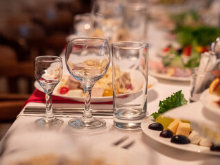 Table set for an event party or wedding reception. Selective focus.