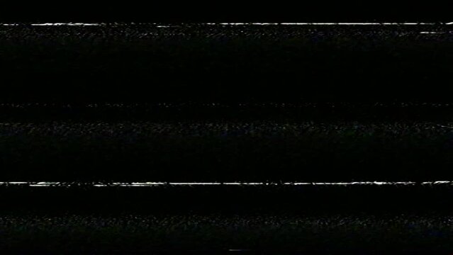 VHS noise from an analog VCR video camcorder. The bad quality of the tape leads to visual effects typical for this type of vintage video camera. Perfect overlay footage to create a retro look.