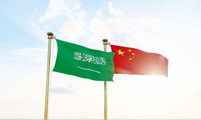 China and Saudi Arabia flags waving together on blue sky. 