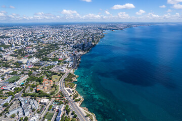 Beautiful aerial view of the city of Santo Domingo - Dominican Republic with is Parks, buildings, suburbs ,turquoise Caribbean ocean, parks and malecon