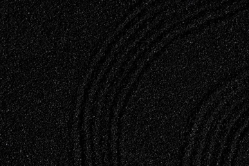Fotobehang Zen Zen garden, Japanese garden with art line pattern on black sand background,Top Sand Nature texture surface with wave lines pattern,Background banner for Harmony,Meditation,Feng Shui,Zen like concept  © Anchalee