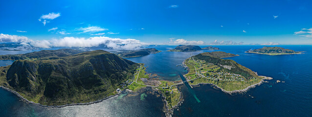 Aerial view of Dynamic fjord landscape in Norway with bridges connecting Islands in the Ocean   
