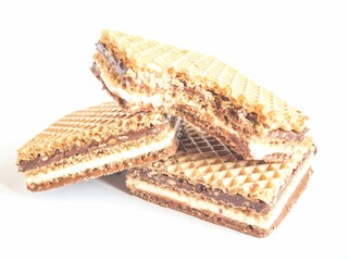 Closeup of a stack of waffles on a white background