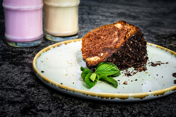 Close-Up of Chocolate Cake Slice on Plate. Ideal for dessert, bakery, or celebration-themed projects, this high-resolution image captures the delicious details and culinary artistry. Selective focus