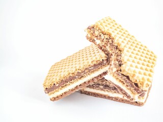 two chocolate wafer sandwiches cut in half with other pieces missing