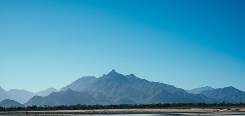 Picturesque scene of majestic mountains on a sunny, clear day