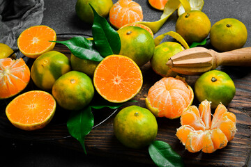 Grenade orange fruit. Home gardening. Mandarin oranges. Tangerine oranges. Orange color.