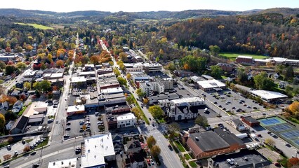Countryside landscape showing typical small town USA living with streets, business, and neighborhoods in Wellsboro, Pennsylvania during Autumn Fall season colors

