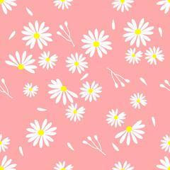 Daisies and fallen leaves in autumn