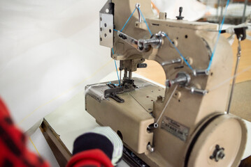 workshop of sewing machine. textile production