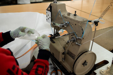 workshop of sewing machine. textile production
