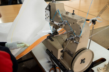 workshop of sewing machine. textile production