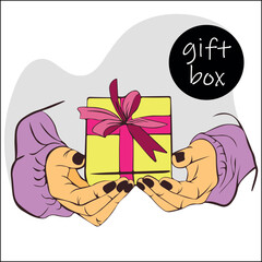 Female hands hold gift box with ribbon and bow. hands hold gift box made of yellow paper with bright pink bow of satin ribbon. The concept of giving gifts, receiving surprise.