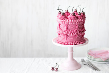 Birthday cake with pink vintage buttercream piping