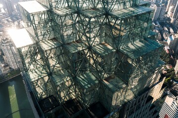 View of the pyramid-shaped dome of a modern, sky-scraping building.