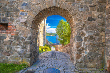 Scenic stone gate in Oslo Akershus Fortress historic architecture view