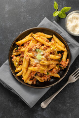 Pasta bolognese with minced meat and cheese. 