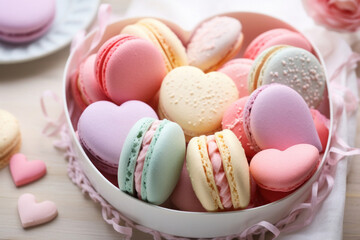Valentine's Day themed macarons in a heart-shaped box, pastel colors
