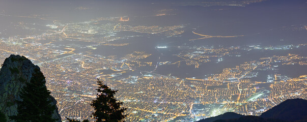Night view of Uludag city, the 5th largest industrial city of Turkey, from Uludag mountain. Bursa city. Turkey. 2023