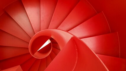 Top-down view of a stunning spiral red staircase