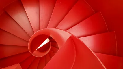 Fotobehang Trappen Top-down view of a stunning spiral red staircase  © Wirestock
