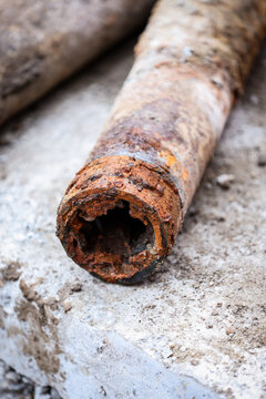Detail shot with old and rusty drinking water pipes