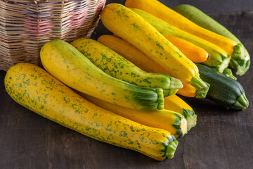 Yellow green leopard spotted zucchini. Vegetables on the table. vegetable marrow harvest. Food...