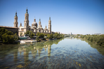 Fototapeta premium Zaragoza landscape with cathedral-Basilica of Our Lady of the Pillarm and river ebro