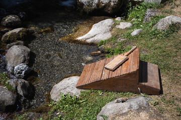 Vintage wooden washboard near the river, Pyrenees, Spain
