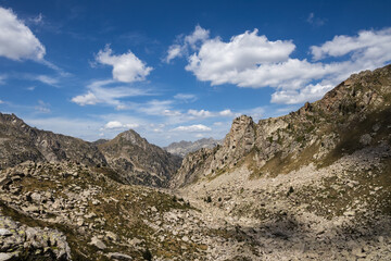 Beautiful landscape of the natural park of Aigestortes y Estany de Sant Maurici, Pyrenees valley with river and lake