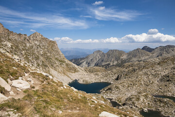 Beautiful landscape of the natural park of Aigestortes y Estany de Sant Maurici, Pyrenees valley with river and lake