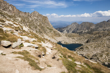 Beautiful landscape of the natural park of Aigestortes y Estany de Sant Maurici, Pyrenees valley with river and lake