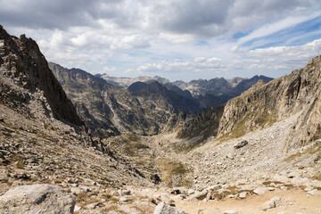 Beautiful landscape of the natural park of Aigestortes y Estany de Sant Maurici, Pyrenees valley with river and lake