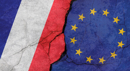 France and European Union flags, concrete wall texture with cracks, grunge background, military conflict concept