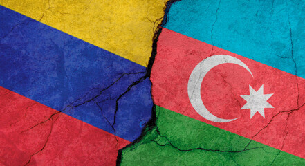 Venezuela and Azerbaijan flags texture of concrete wall with cracks, grunge background, military conflict concept