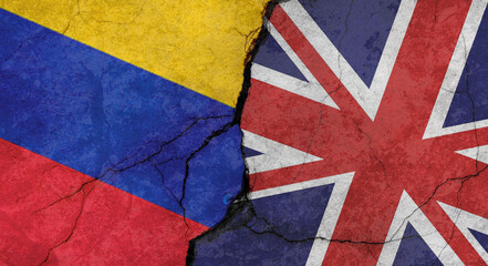 Flags of Venezuela and Great Britain texture of concrete wall with cracks, grunge background, military conflict concept