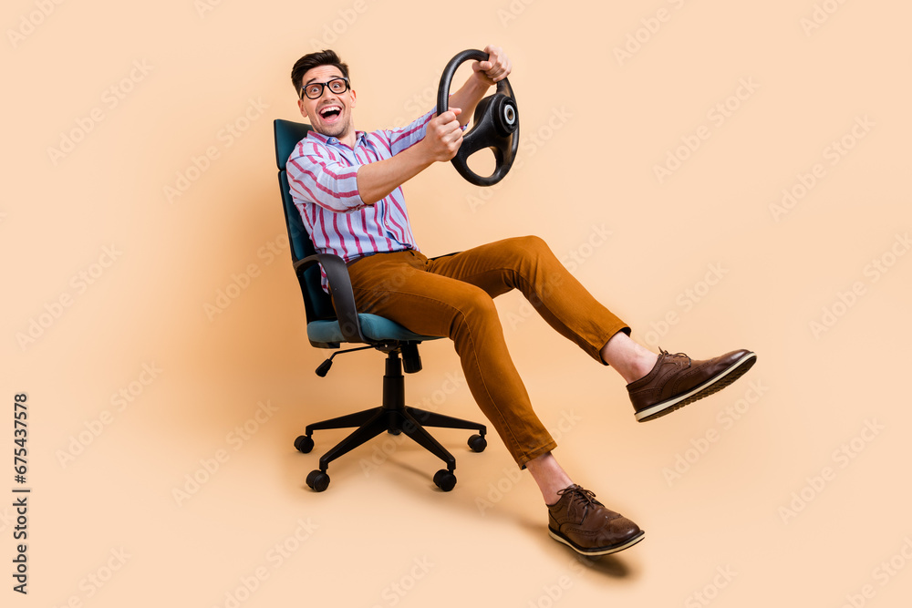 Sticker full length photo of funky nice good mood man assistant boss riding office armchair isolated on beig