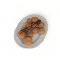 Fried fish balls on serving plate-