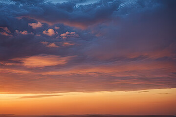 Fototapeta premium scenic view of cloudy sky during sunset