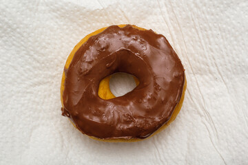Overhead view of a delicious chocolate covered donut