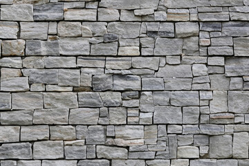 Obraz premium Modern stone brick wall background. stone texture.