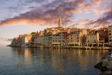Sunset in Rovinj,  Croatia on the west coast of the Istrian peninsula. Colorful evening seascape of...