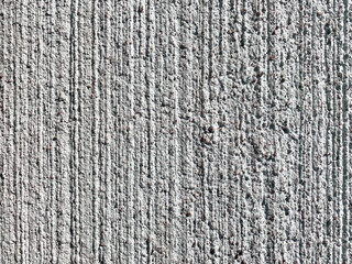 Concrete cement wall with rough surface. Texture background close-up. Space for text.