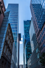 Modern skyscrapers in a financial district, blue colors - obrazy, fototapety, plakaty